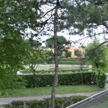 Enjoy A With Pool, Garden And Fireplace Apartment Bibione